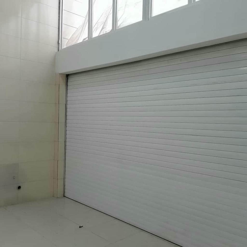 کارخانه کرکره برقی درب کرکره‌ای پارکینگ در بومهن