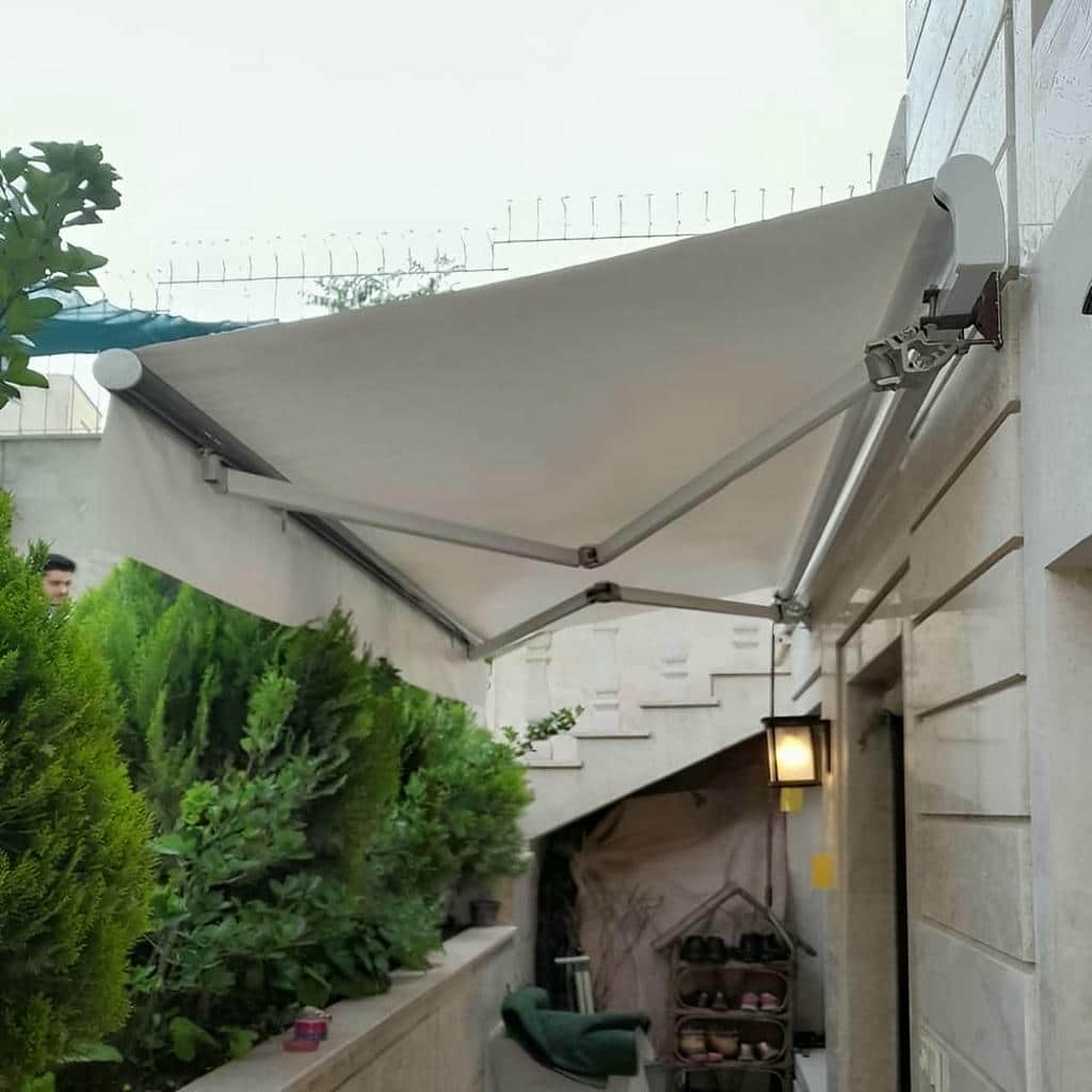 سایبان برقی با سنسور باد و باران با حفاظت از پارچه و بازو