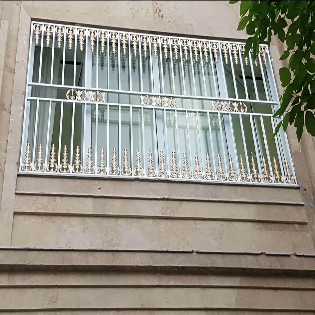 ساخت نرده پنجره فرفورژه گل دار با قاب دوبل
