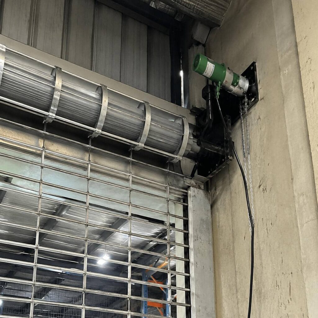 فروش کرکره برقی پارکینگ دارای زنجیر خلاص‌کن