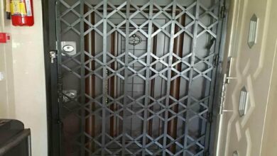 درب آکاردئونی آپارتمان فلزی با طراحی کشویی ورودی منزل