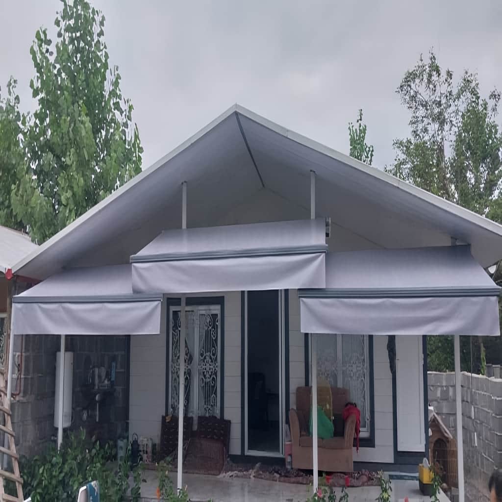 سایبان برقی بازویی روی بالکن استان البرز